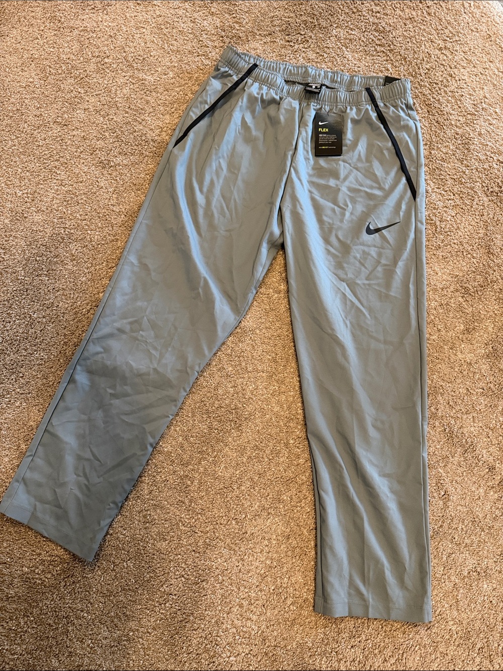 Nike Men’s Light Gray Performance Joggers with Black Accents